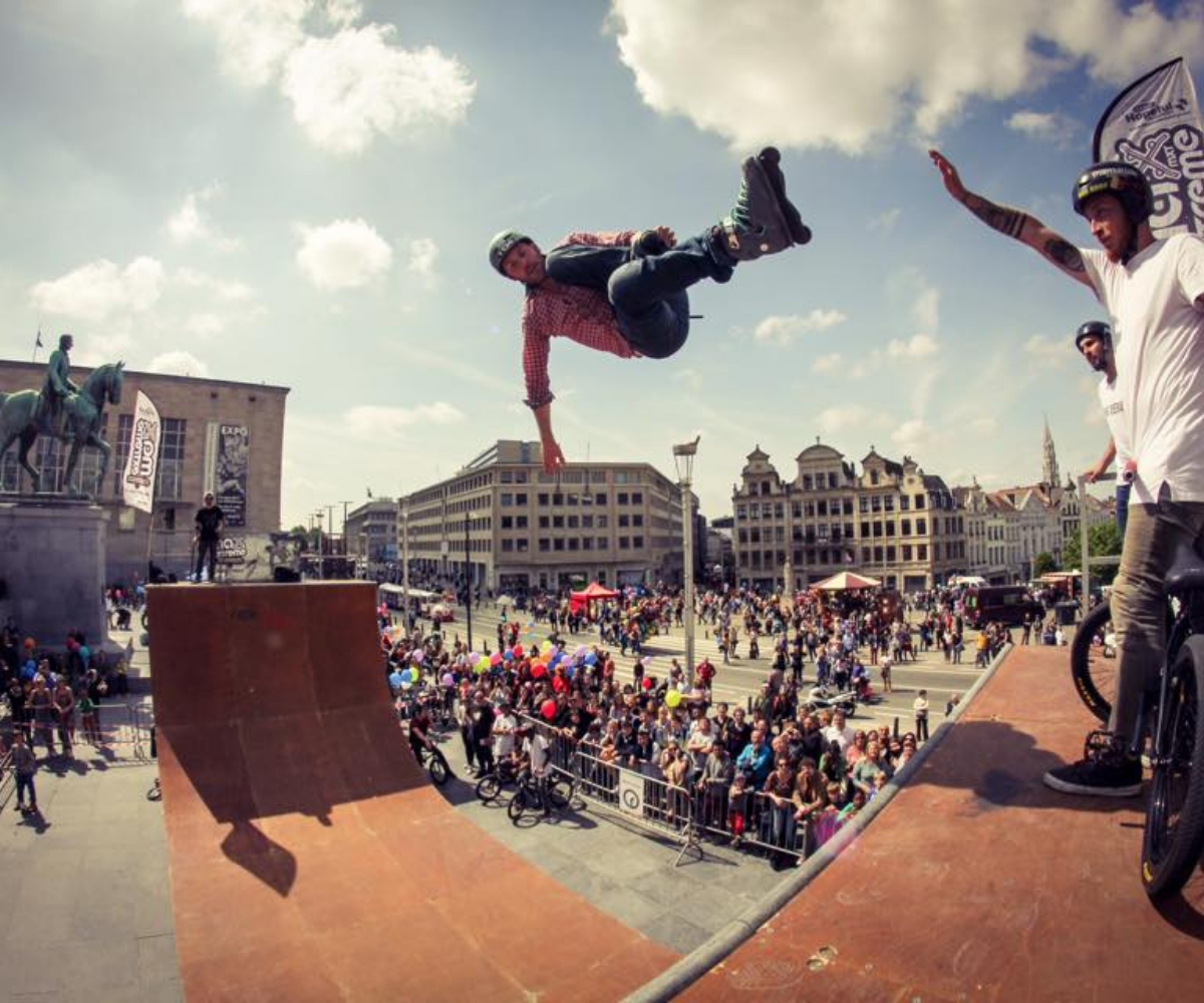 Rideair inline skater performing an aerial jump in Brussels